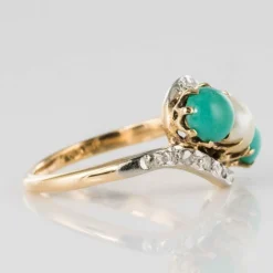 Bague turquoises, perle fine et diamants