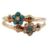 Bague victorienne or rose formant des marguerites ornées de perles et de turquoises