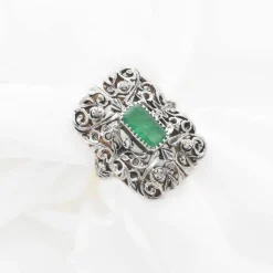 Bague vintage en or et argent avec émeraude