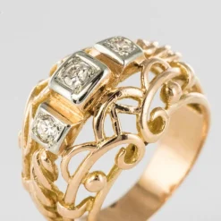Bague vintage fils d'or rose et diamants