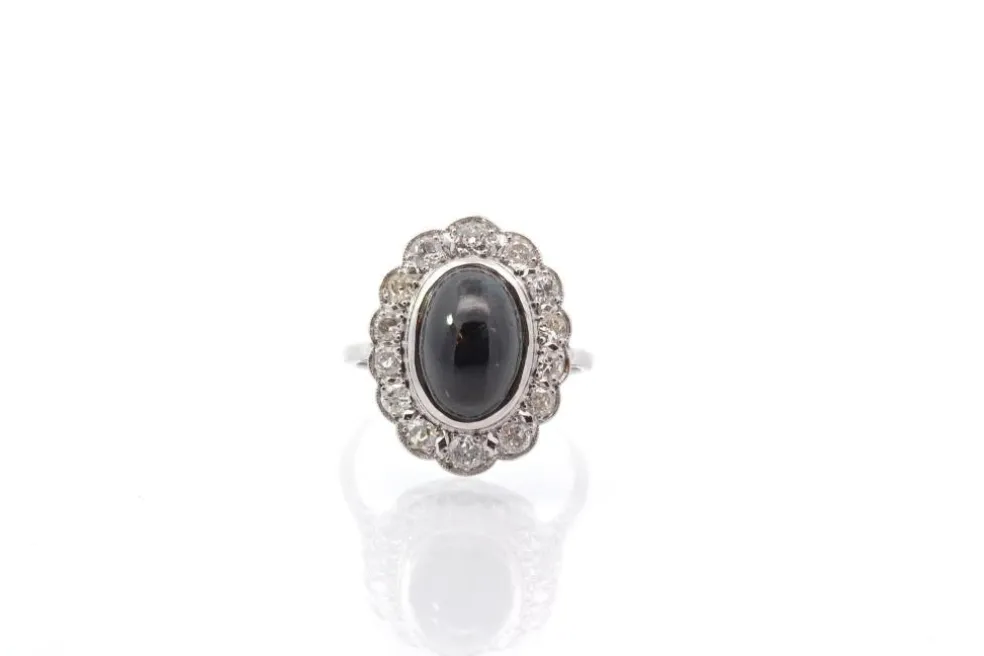 Bague vintage saphir cabochon et diamants en platine