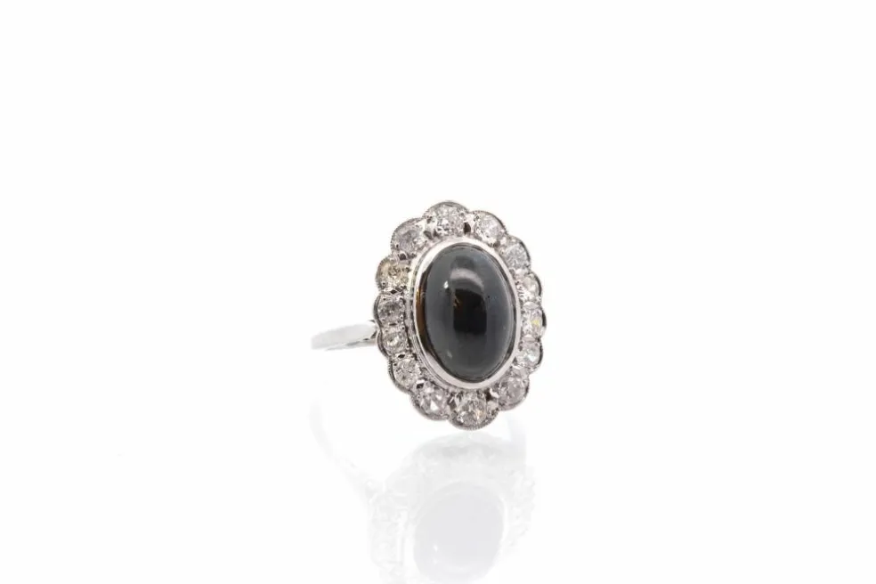 Bague vintage saphir cabochon et diamants en platine