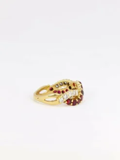 Bague vintage torsadée en or, diamants et rubis