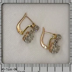 Boucles d'oreilles Art Déco Diamants : L'élégance des années 1920 en or et platine