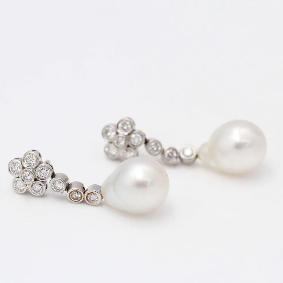 Boucles d'oreilles avec perle d'Australie et diamants