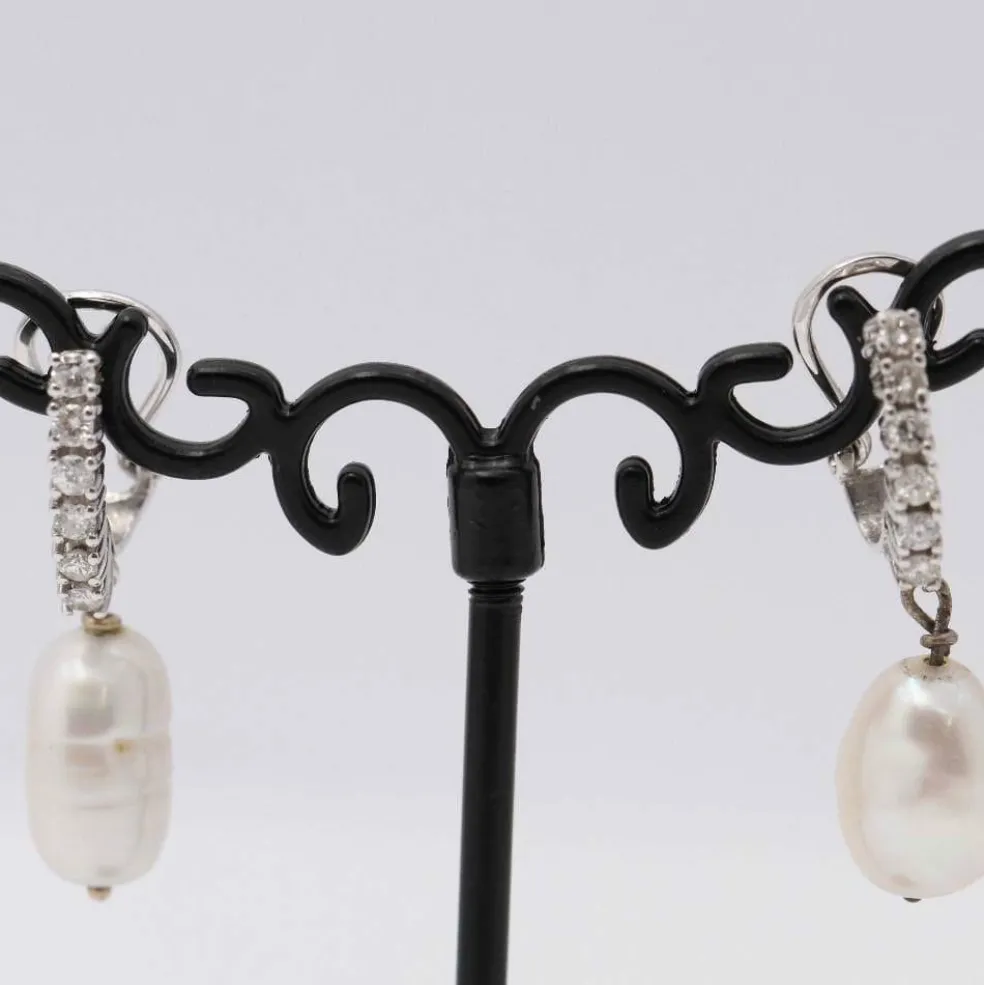 Boucles d'oreilles avec perles baroques et diamants