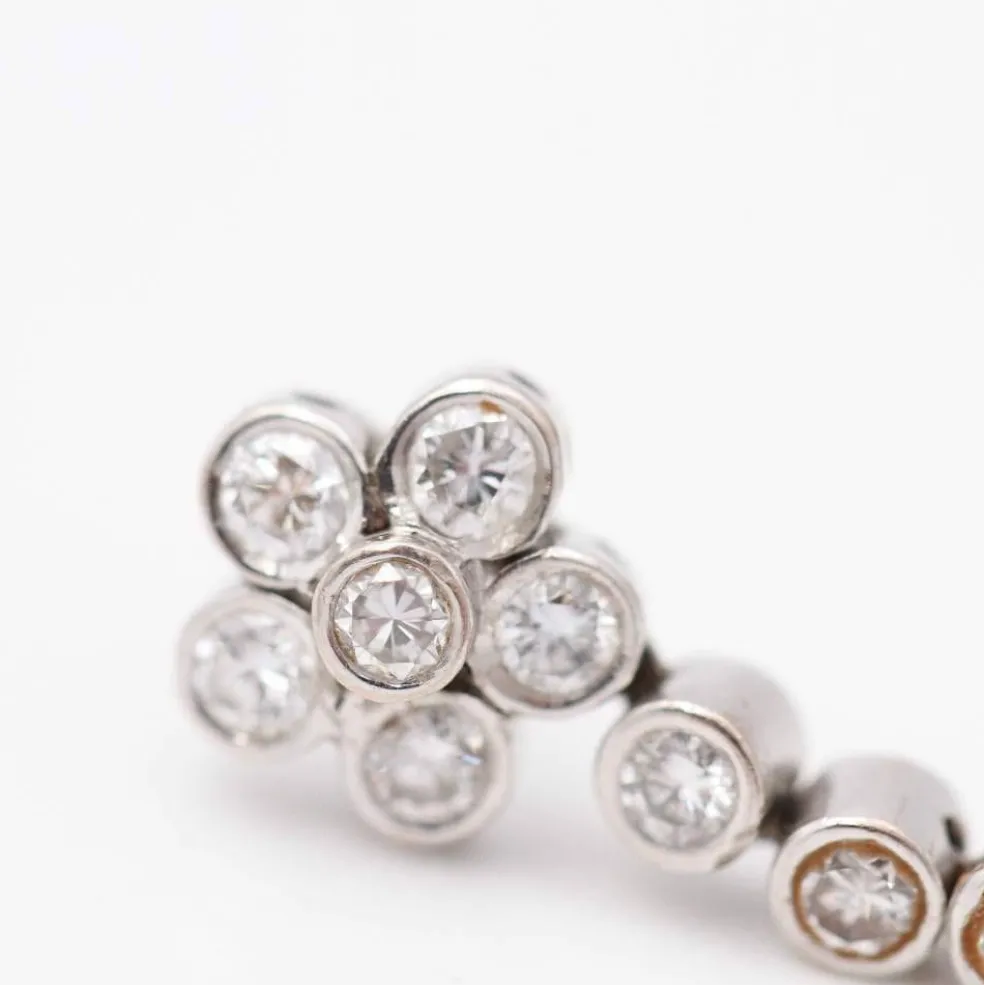 Boucles d'oreilles avec perle d'Australie et diamants