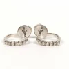 Boucles d'oreilles contemporaines or blanc diamants