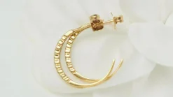 Boucles d'oreilles créoles en or jaune et diamants