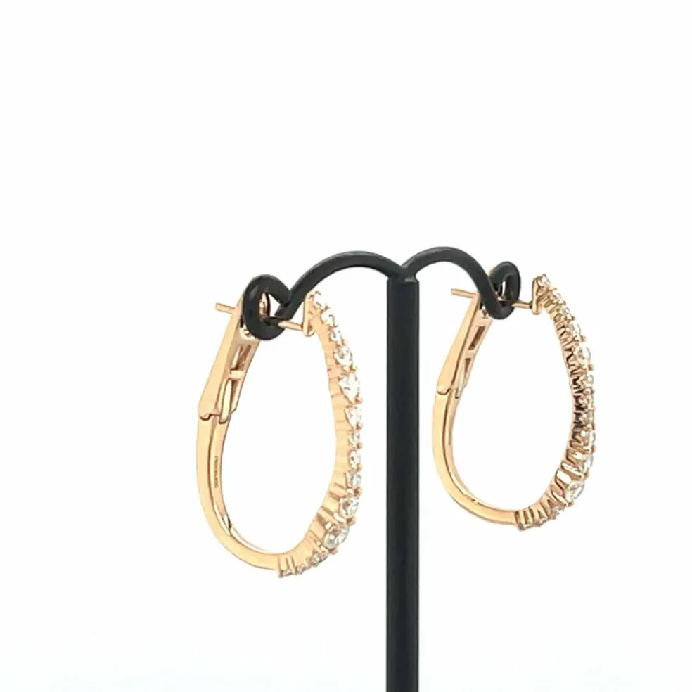 Boucles d'oreilles créoles en or rose 18 carats et diamants
