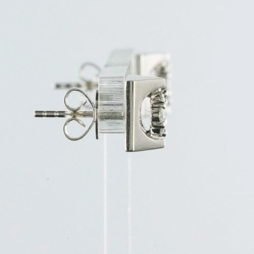 Boucles d'oreilles diamants géométriques