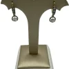 Boucles d’oreilles dormeuses diamants