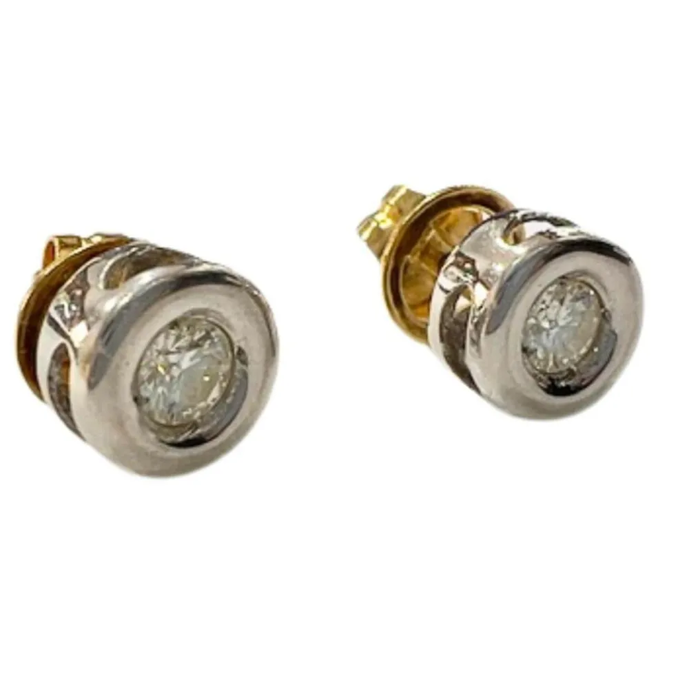 boucles d'oreilles dormeuses en or et diamants