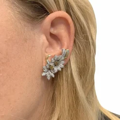 Boucles d'oreilles, "Edelweiss", en or jaune, platine et diamants.