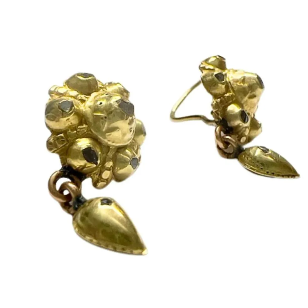 boucles d'oreilles en or avec diamants