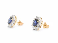 Boucles d'oreilles en or avec diamants et saphir