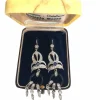 Boucles d'oreilles en or blanc 18 carats avec saphir onyx et diamants