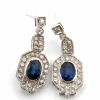 Boucles d'oreilles en or blanc avec saphirs et diamants