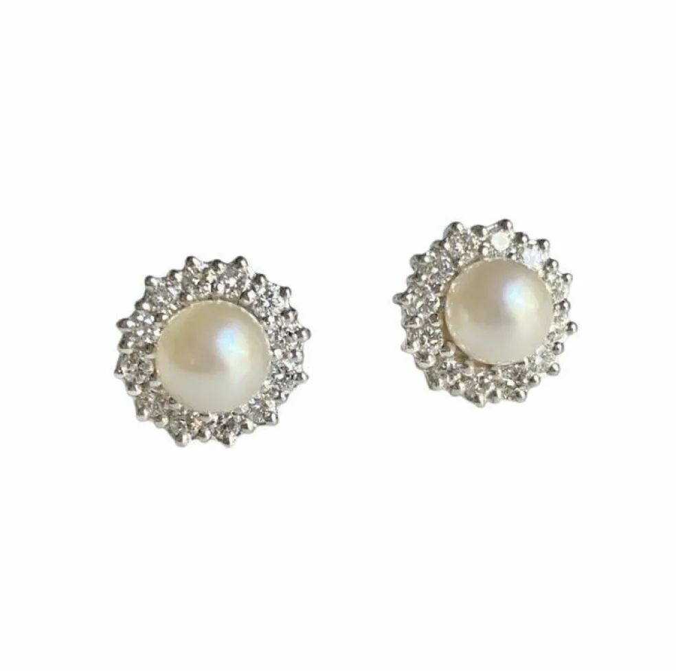 Boucles d'oreilles en or blanc perles et diamants