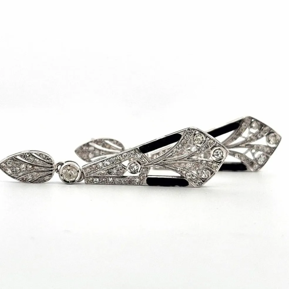 Boucles d'oreilles en or blanc avec diamants et onyx