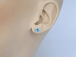 Boucles d'oreilles en or blanc avec topaze