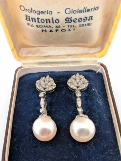 Boucles d'oreilles en or blanc avec perles et diamants