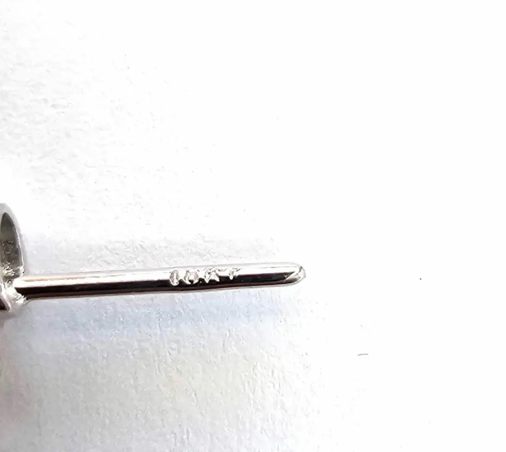 Boucles d'oreilles en or blanc avec diamants