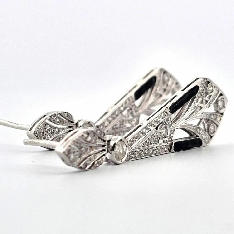 Boucles d'oreilles en or blanc avec diamants et onyx