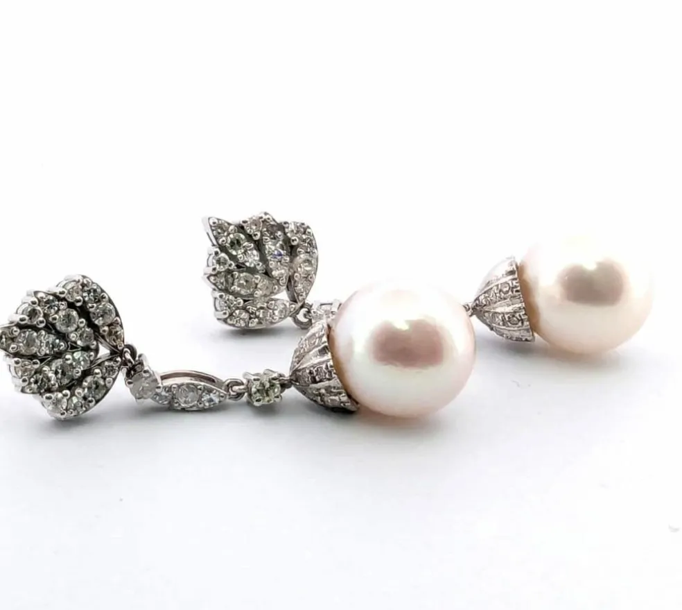 Boucles d'oreilles en or blanc avec perles et diamants
