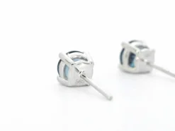 Boucles d'oreilles en or blanc avec topaze