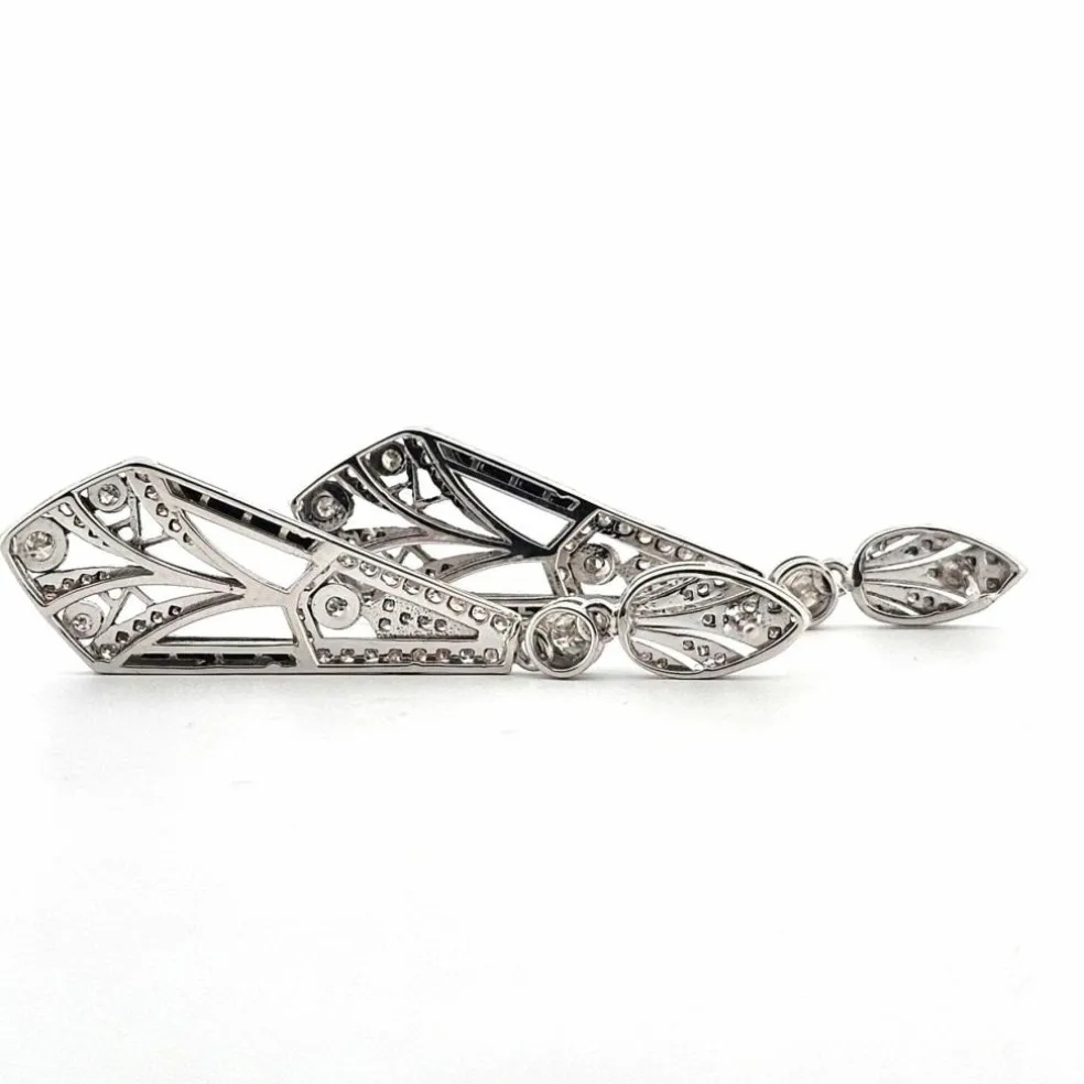 Boucles d'oreilles en or blanc avec diamants et onyx