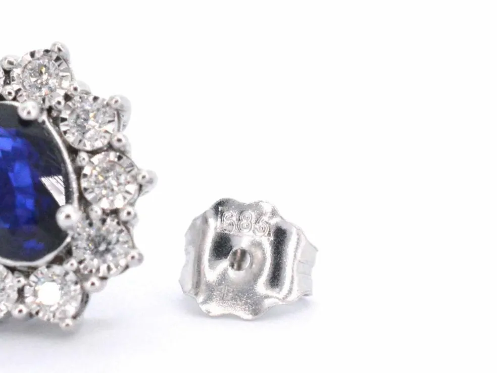 Boucles d'oreilles en or blanc avec diamants et saphir