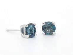 Boucles d'oreilles en or blanc avec topaze