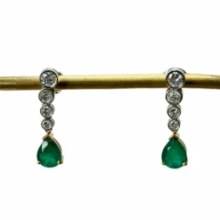 Boucles d'oreilles en Or gris et Emeraudes