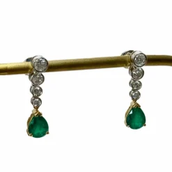 Boucles d'oreilles en Or gris et Emeraudes