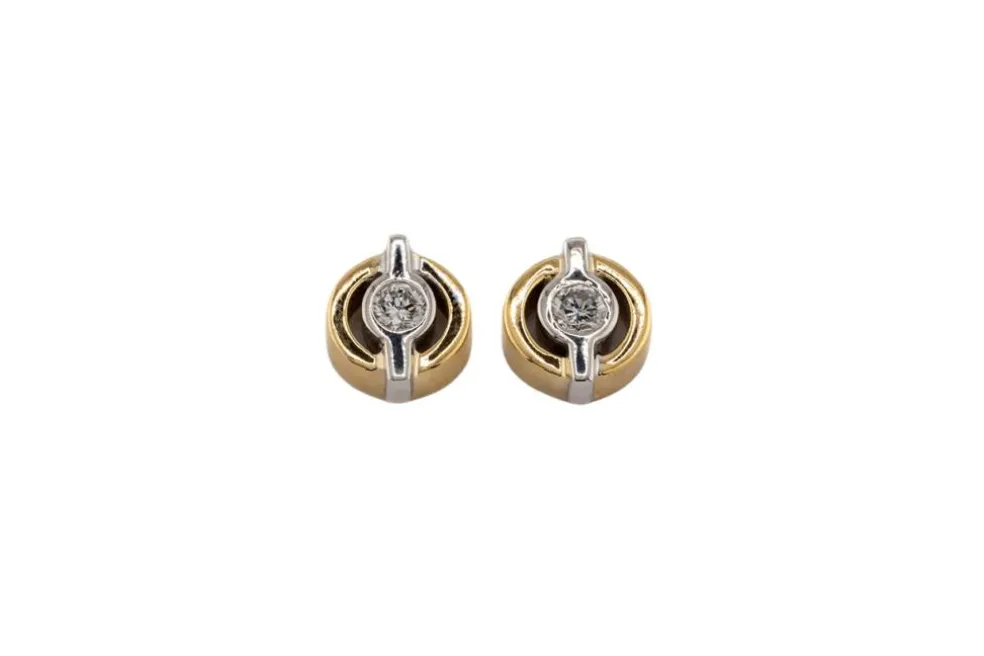 Boucles d'oreilles en or jaune et or blanc avec diamants