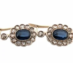 Boucles d'oreilles en or jaune et argent avec saphirs et diamants