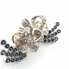 Boucles d'oreilles en platine avec des saphirs et des diamants