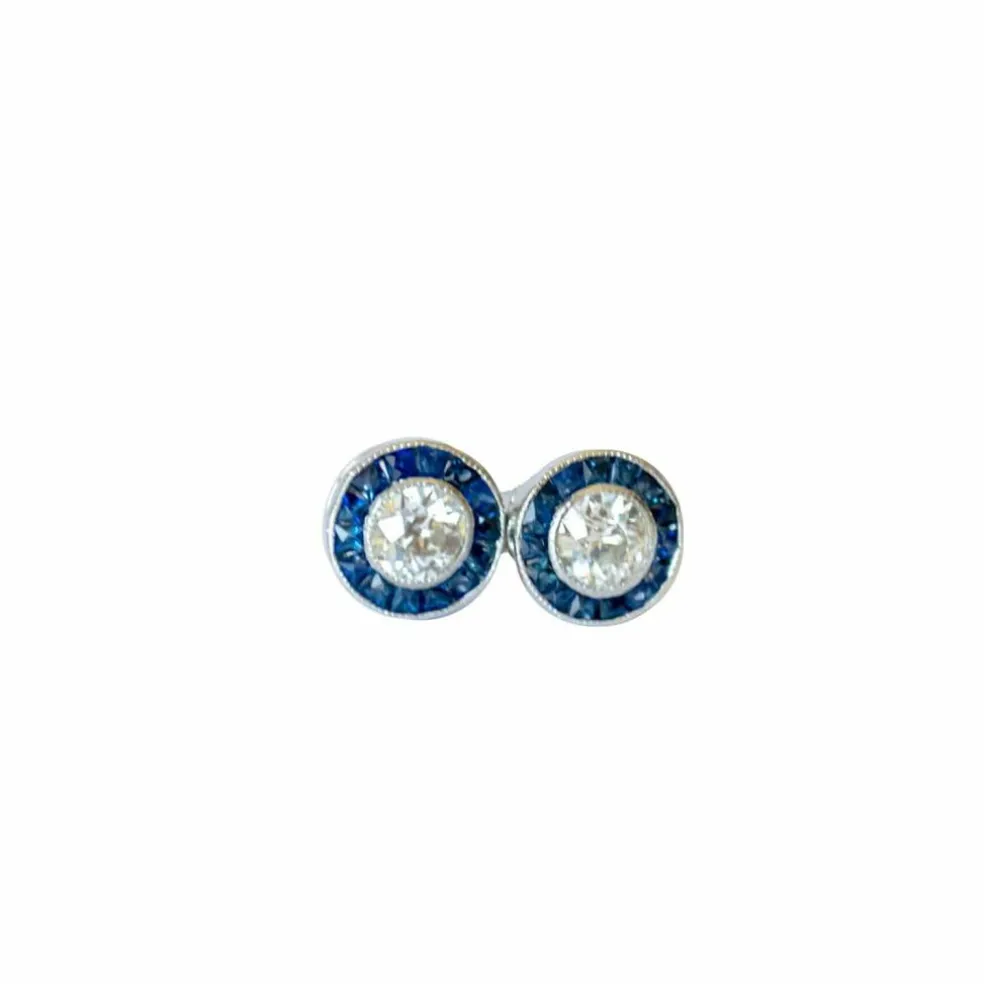 boucles d'oreilles en platine avec diamants et saphirs