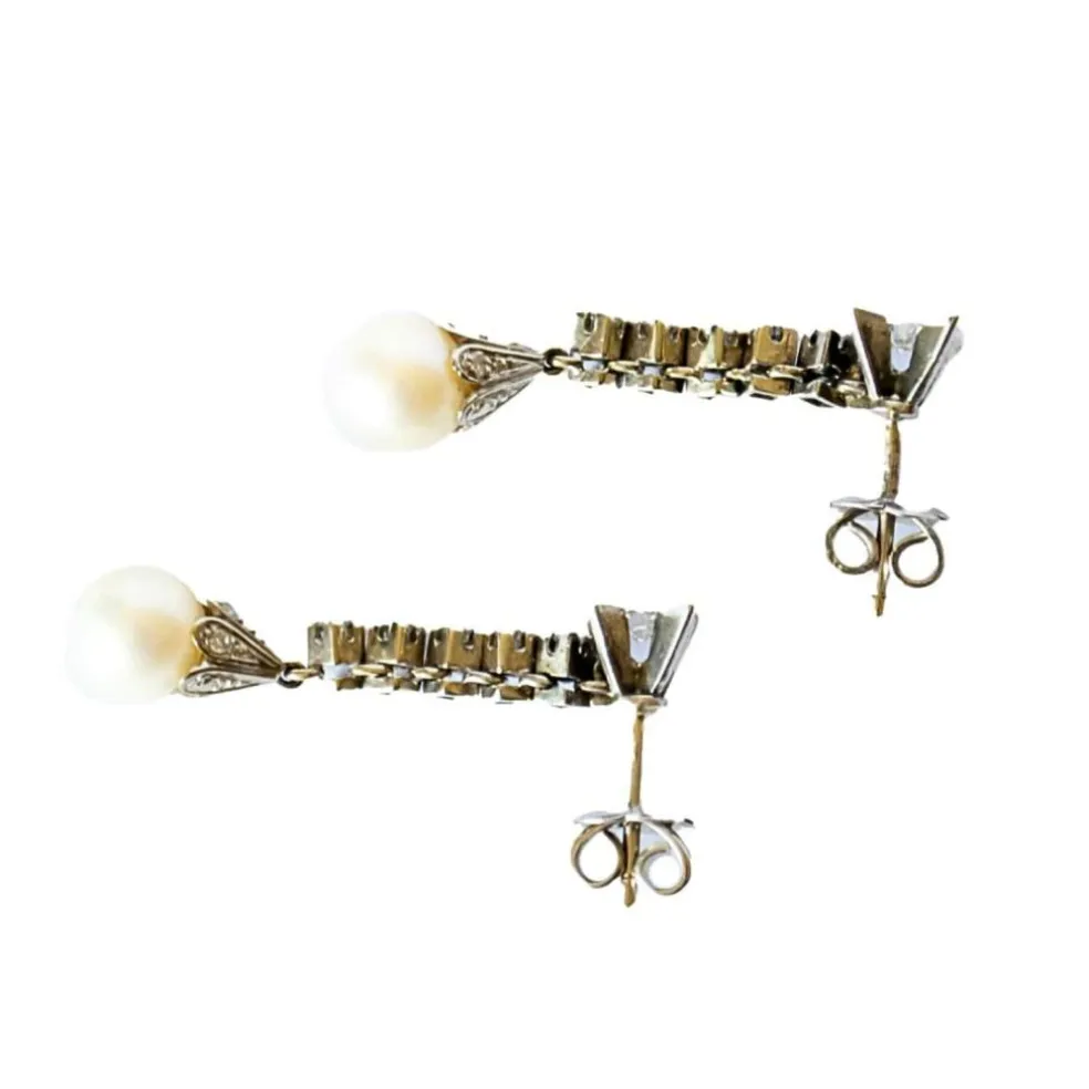 Boucles d'oreilles en platine avec diamants et perle
