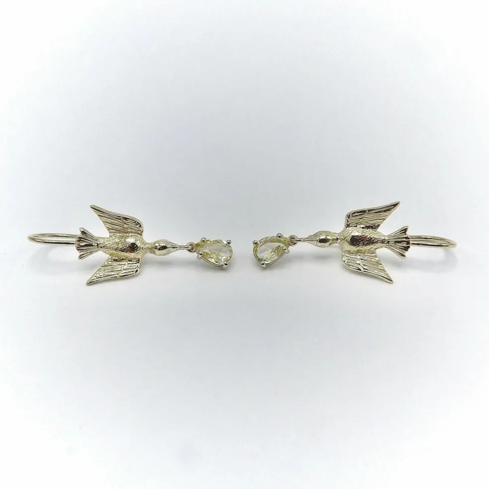 Boucles d'oreilles hirondelle en or avec saphirs jaunes