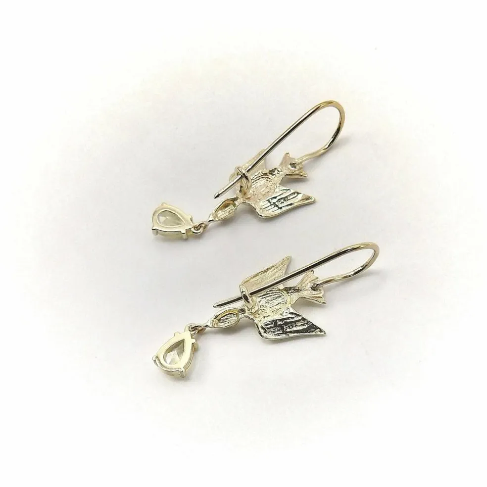 Boucles d'oreilles hirondelle en or avec saphirs jaunes