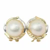 Boucles d'oreilles importantes en or bicolore et demis perles