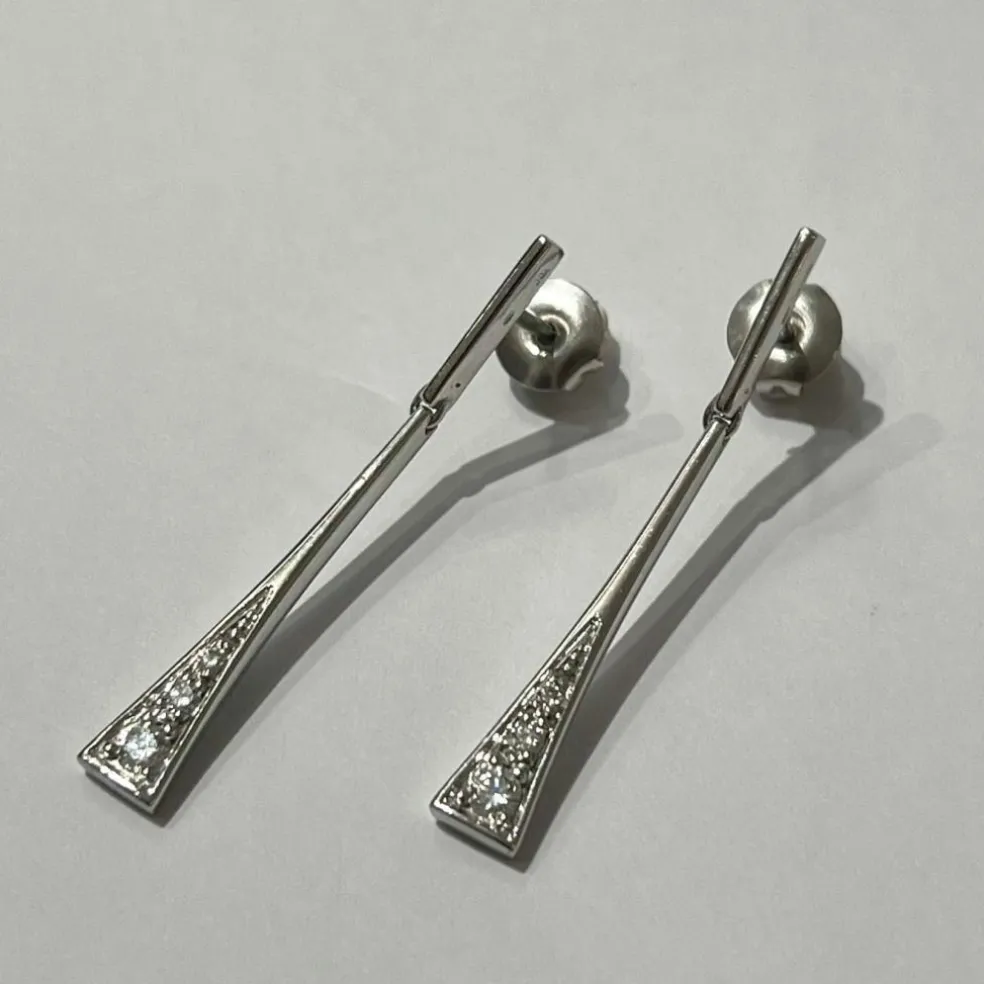 Boucles d’oreilles longues or blanc diamants