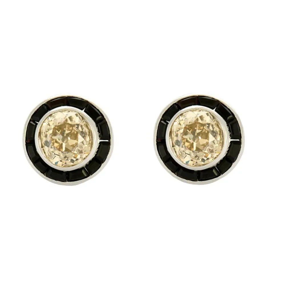 Boucles d'oreilles or blanc, diamants et onyx