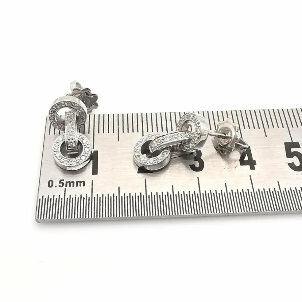 Boucles d'oreilles or blanc diamants