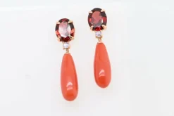 Boucles d'oreilles pendantes en or jaune avec grenat et tanzanite