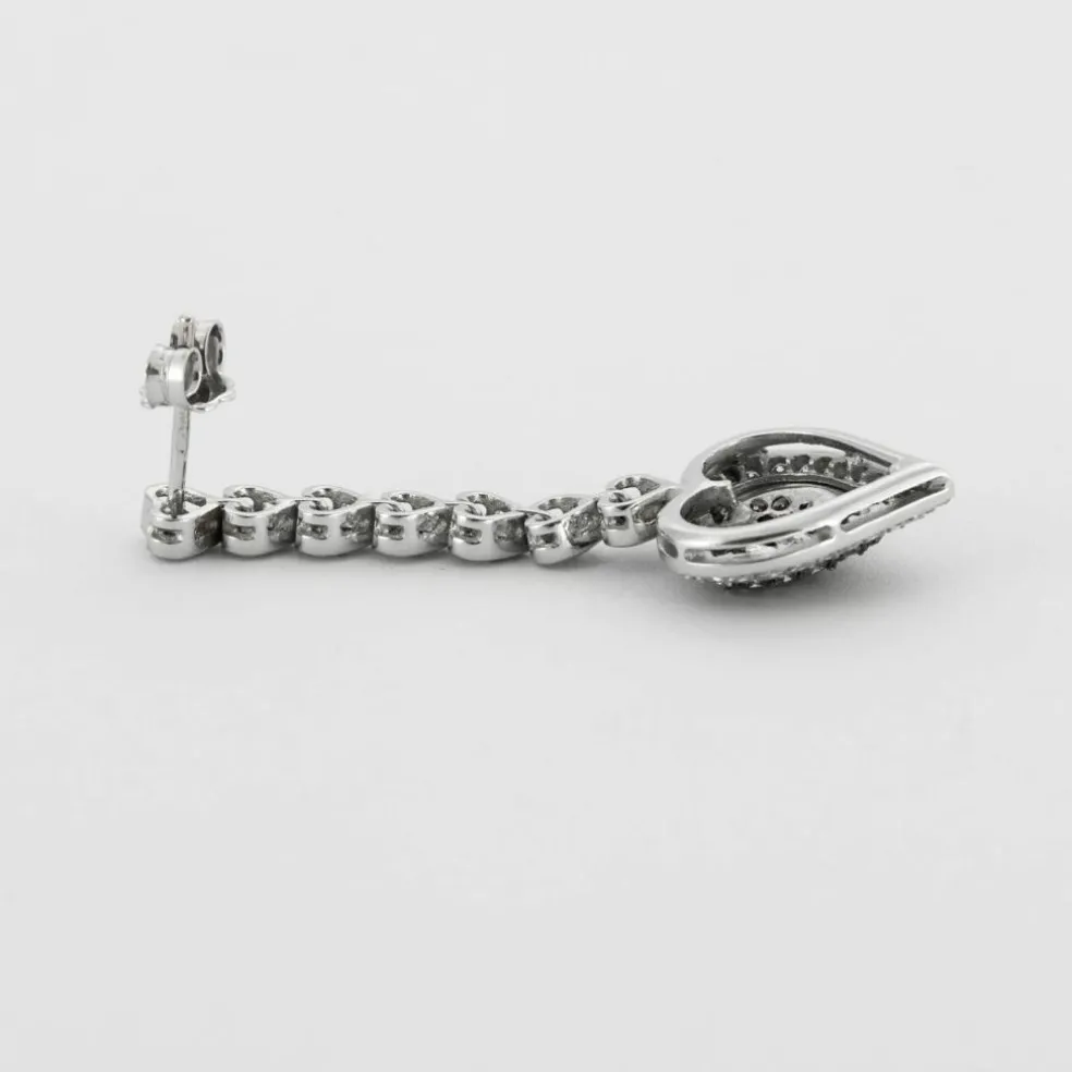 Boucles d'oreilles pendantes coeur diamants