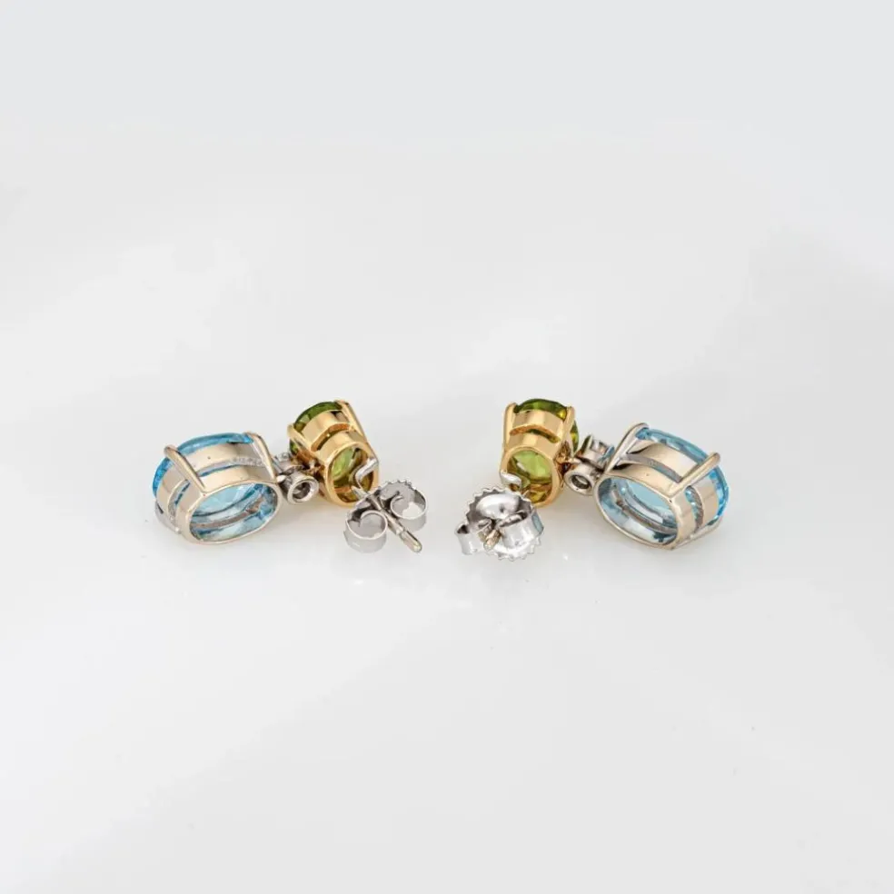 Boucles d'oreilles pendantes topaze bleue, péridot et diamants