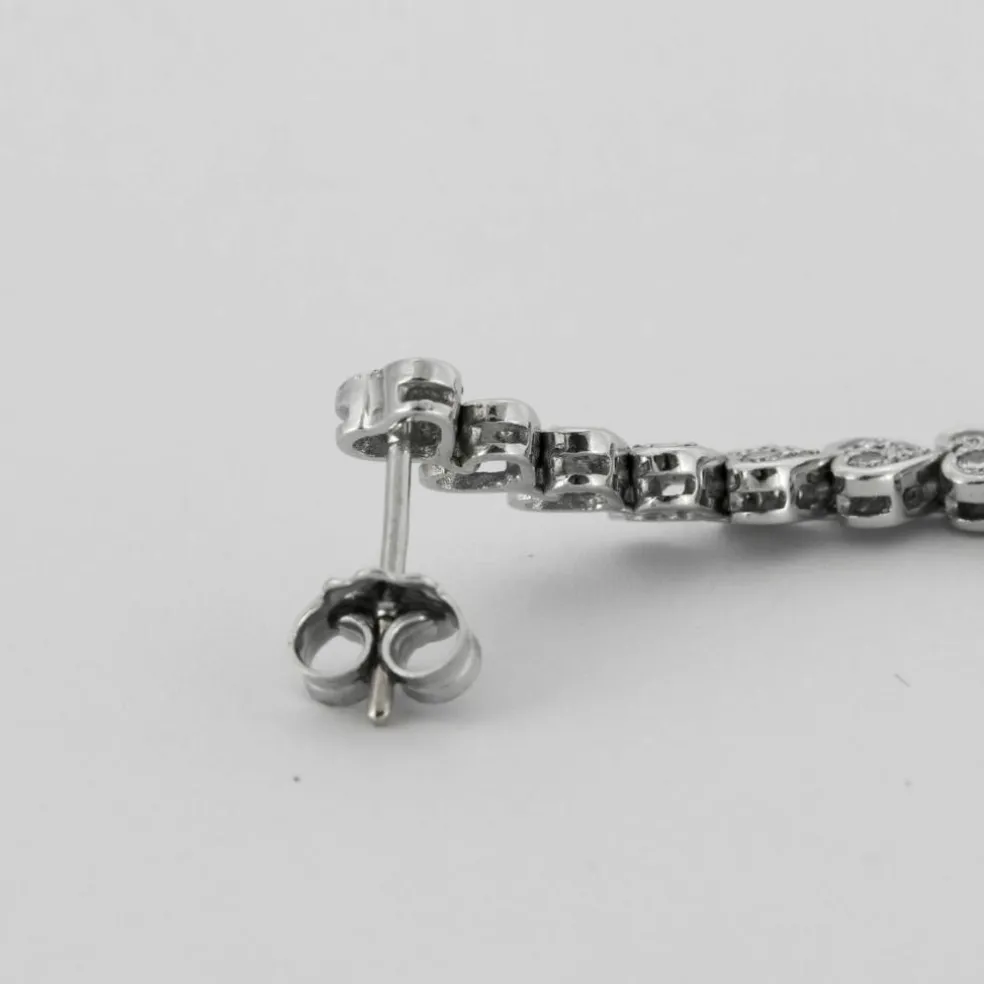 Boucles d'oreilles pendantes coeur diamants